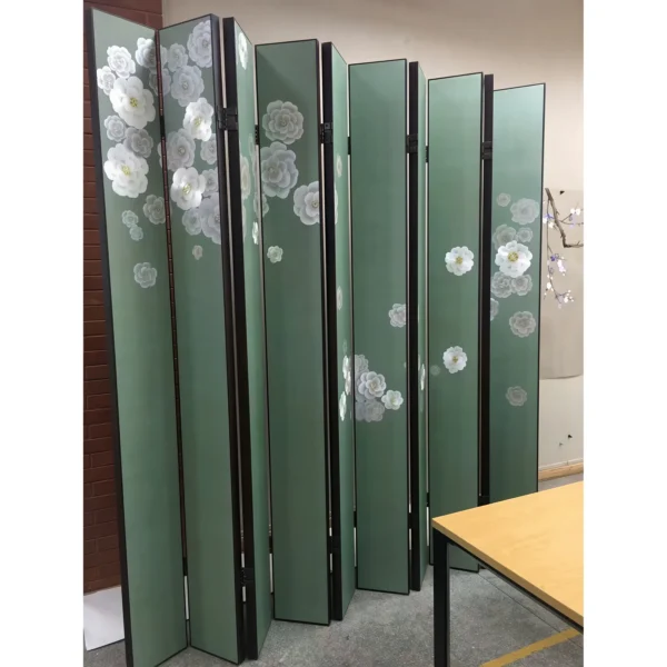 Pea-Green Camellia Eight-Panel Folding Screen in olive — in a room setting