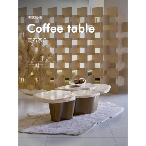 Pebble Landform Cream Marble Coffee Table Cluster in oatmeal — in a room setting