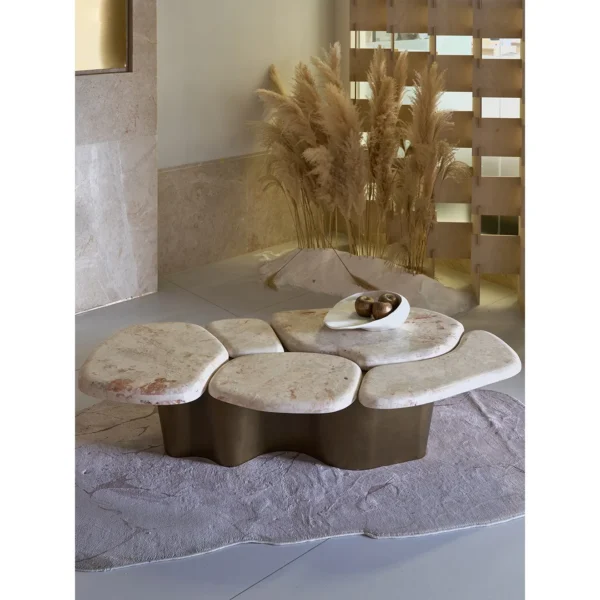 Pebble Landform Cream Marble Coffee Table Cluster in oatmeal — in a room setting