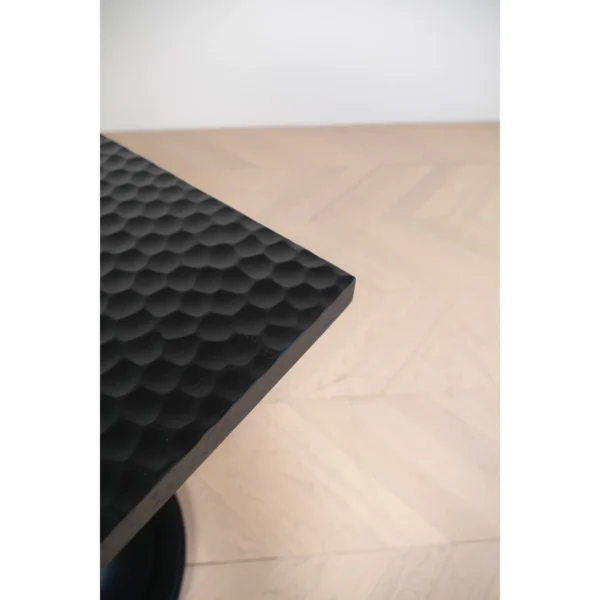 Inkstone Solid Wood Pedestal Table with Turned Old Wood Base in black — in a room setting