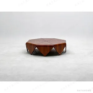 Petal Hexagonal Rosewood Veneer Coffee Table in clay — in a room setting