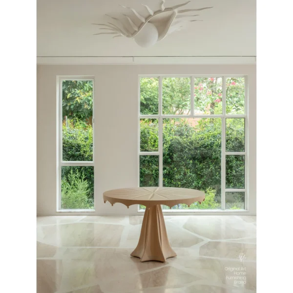 Petal Round Dining Table with Radiating Marquetry in sand — in a room setting