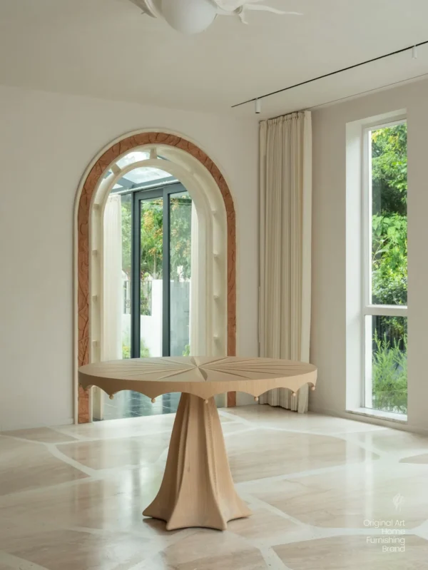 Petal Round Dining Table with Radiating Marquetry in sand — in a room setting