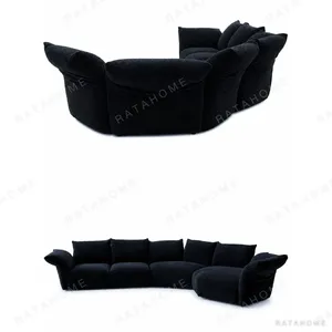 Petal Modular Sofa in Ink Blue with Steel-Framed Curved Arms — in a room setting