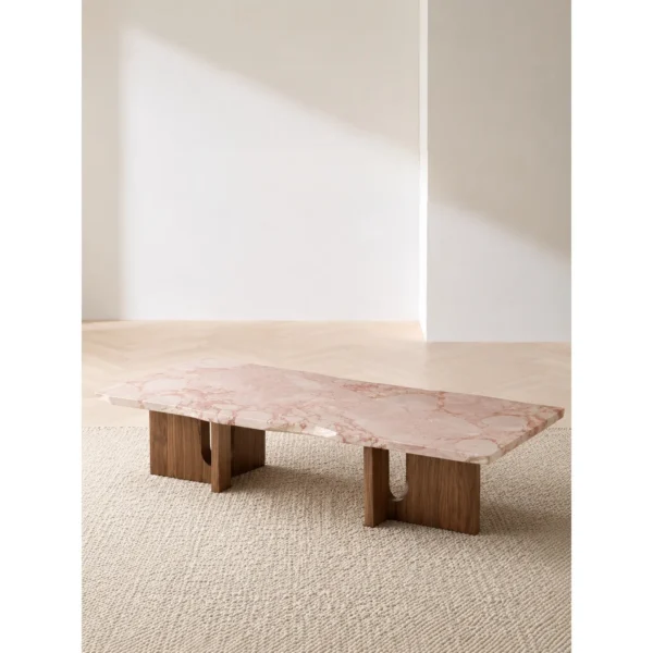 Pink Marble Square Coffee Table on Walnut Bridge Base in rose stone — in a room setting