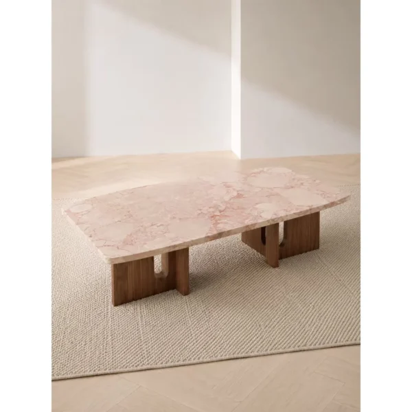 Pink Marble Square Coffee Table on Walnut Bridge Base in rose stone — in a room setting