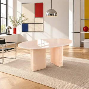 Pink Jade Oval Coffee Table with Gold Veining in rose stone — in a room setting