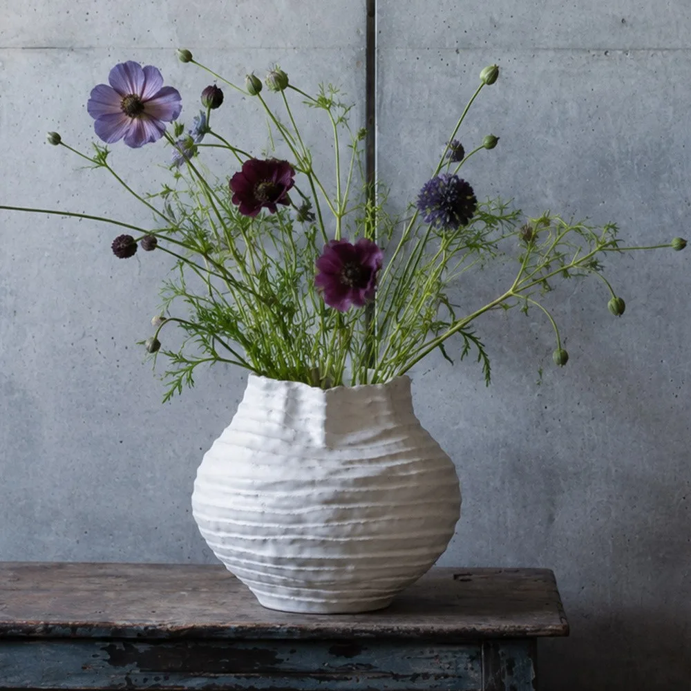 Plain White Layered Pleat Ceramic Vase with Torn Rim in ivory — front view