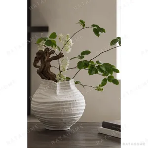 Plain White Layered Pleat Ceramic Vase with Torn Rim in ivory — in a room setting