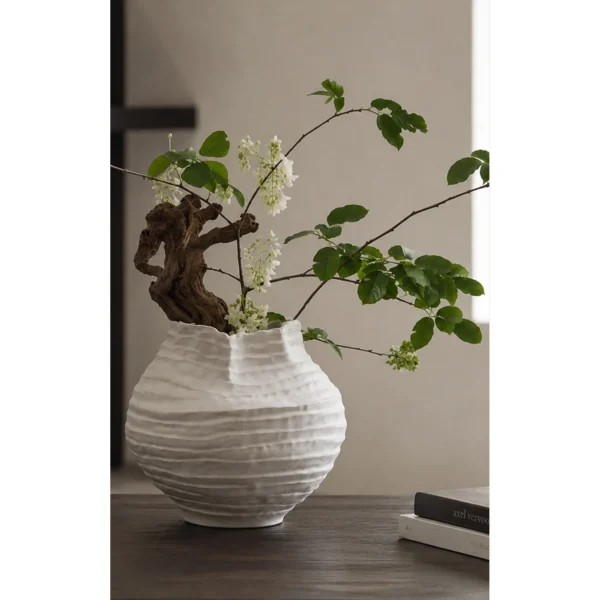 Plain White Layered Pleat Ceramic Vase with Torn Rim in ivory — in a room setting