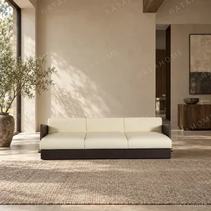 Platform Low-Base Sofa in Cream Leather with Brass Feet — in a room setting