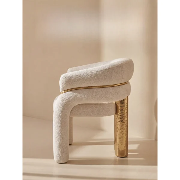 Vespera Cream Teddy Tub Chair with Gold Trim on Brass Legs in oatmeal — in a room setting
