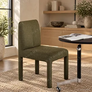 Plum Fully Upholstered Armless Chair in Olive Green — in a room setting