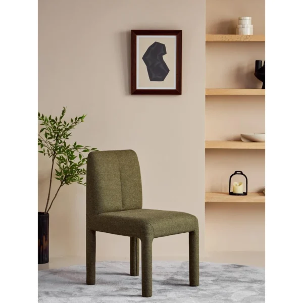 Plum Fully Upholstered Armless Chair in Olive Green — in a room setting
