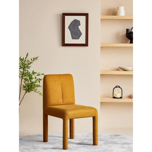 Plum Fully Upholstered Armless Chair in Olive Green — in a room setting