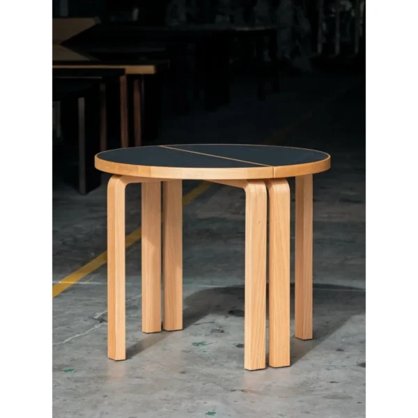 Two-Half Round Table with Black Top and Bentwood Legs in black — in a room setting