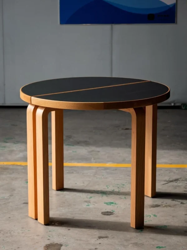 Two-Half Round Table with Black Top and Bentwood Legs in black — in a room setting