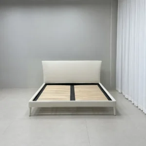 Feibo Upholstered Bed on Tapered Legs in ivory — front view