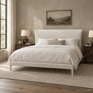 Feibo Upholstered Bed on Tapered Legs in ivory — in a room setting