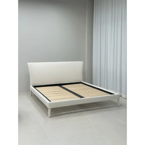Feibo Upholstered Bed on Tapered Legs in ivory — in a room setting