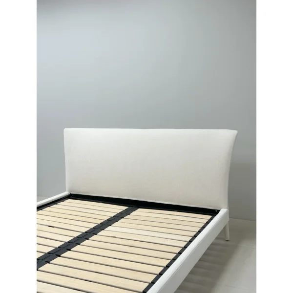 Feibo Upholstered Bed on Tapered Legs in ivory — in a room setting