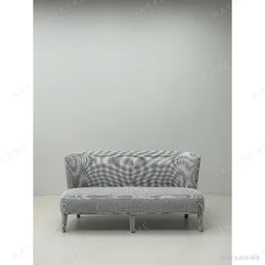 Poly Feibo Loveseat in Grey Textured Fabric on Tapered Legs — in a room setting