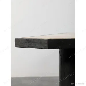 Polygonal Marble-Inset Low Table on Black Wood Legs in black — in a room setting