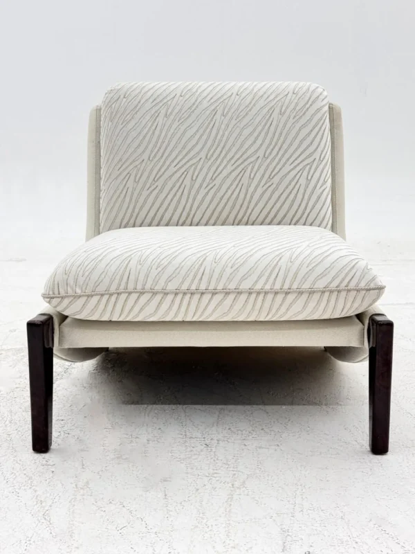 Ponytail Armless Lounge Chair in Cream Textured Fabric — in a room setting