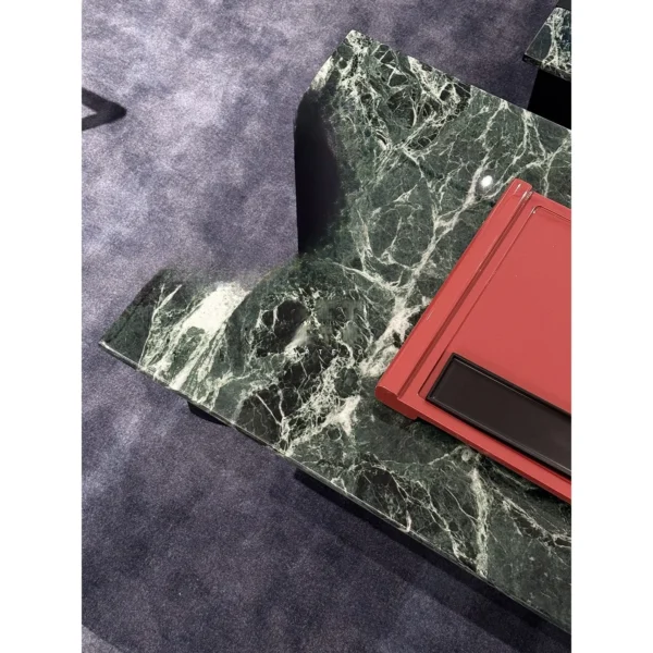 Green Marble Crescent Coffee Table Set with Black Arch Bases in olive — in a room setting