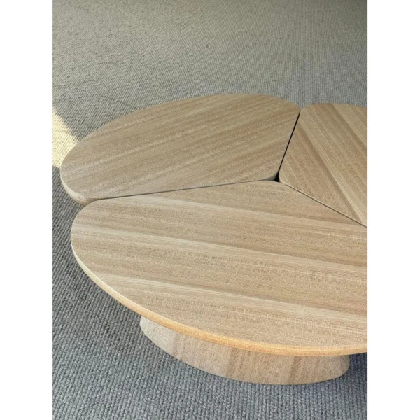 Petal Three-Piece Round Coffee Table in natural oak — in a room setting
