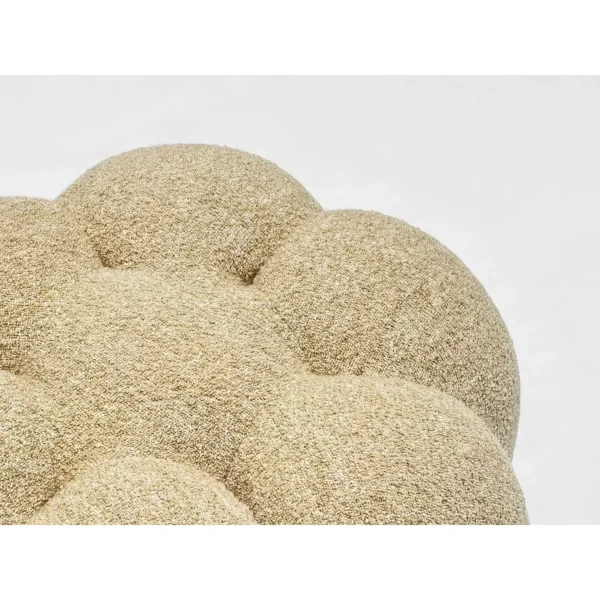 Pumpkin Bouclé Swivel Sofa Stool on Metal Base in sand — in a room setting