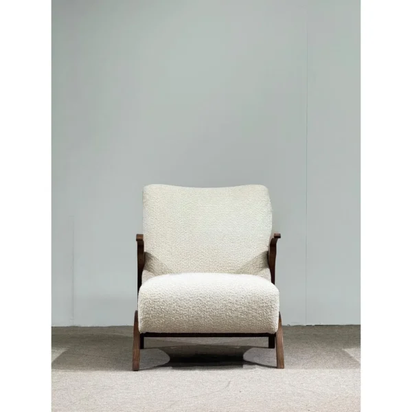 Pure White Bouclé Lounge Chair with Black Walnut Arms in ivory — in a room setting