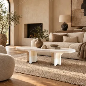 Pushi Raw Stone Dining Table with Block-Built Base in oatmeal — in a room setting