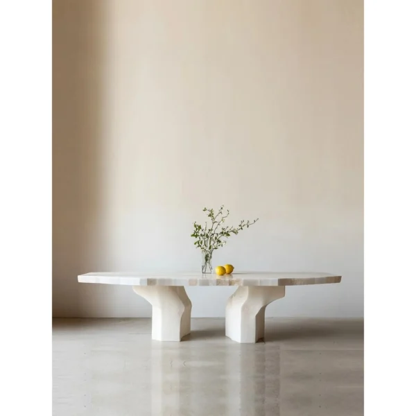 Pushi Rough-Hewn Pale Stone Dining Table in oatmeal — in a room setting