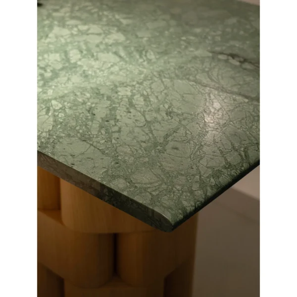 Indian Green Stone Dining Table on Woven Ash Column Legs in olive — in a room setting