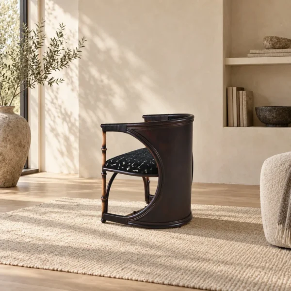 Qionglan Bamboo and Rattan Barrel Chair in black — in a room setting