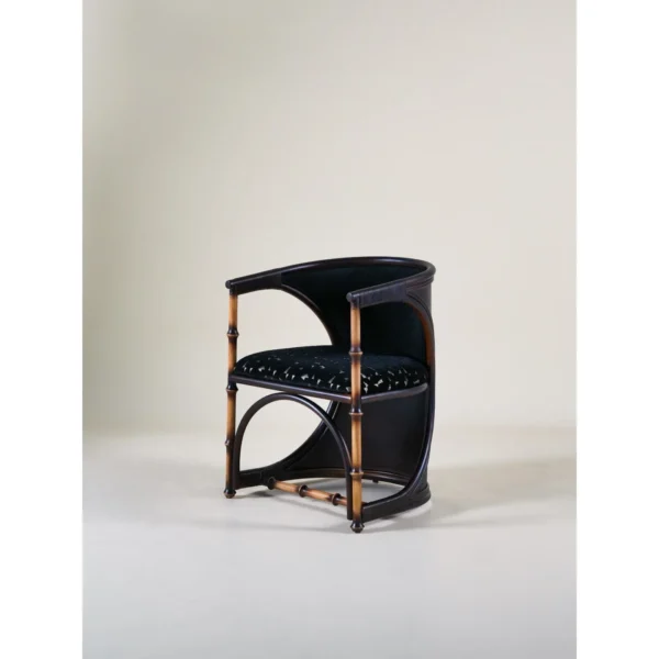 Qionglan Bamboo and Rattan Barrel Chair in black — in a room setting