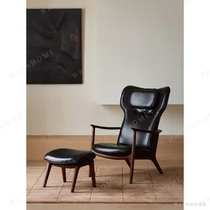 Qiyan Eaves Wingback Lounge Chair with Ottoman in Cream Wool — in a room setting