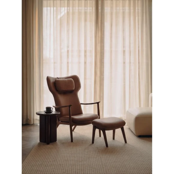 Qiyan Eaves Wingback Lounge Chair with Ottoman in Cream Wool — in a room setting