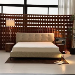 Bouclé Bed with Tufted Headboard on Black Frame in oatmeal — front view