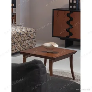 Quzhi Solid Wood Side Table with Curved Branch Legs in walnut — in a room setting