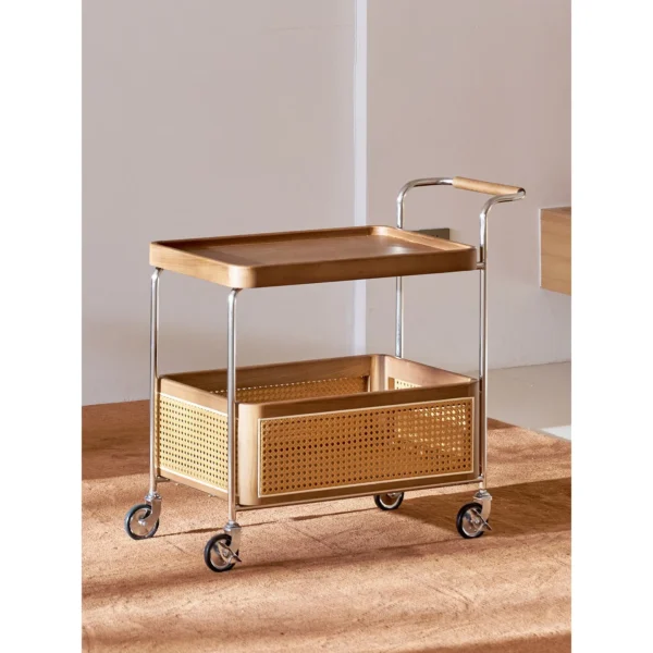 Rattan and Walnut Two-Tier Bar Cart on Chrome Frame in walnut — in a room setting