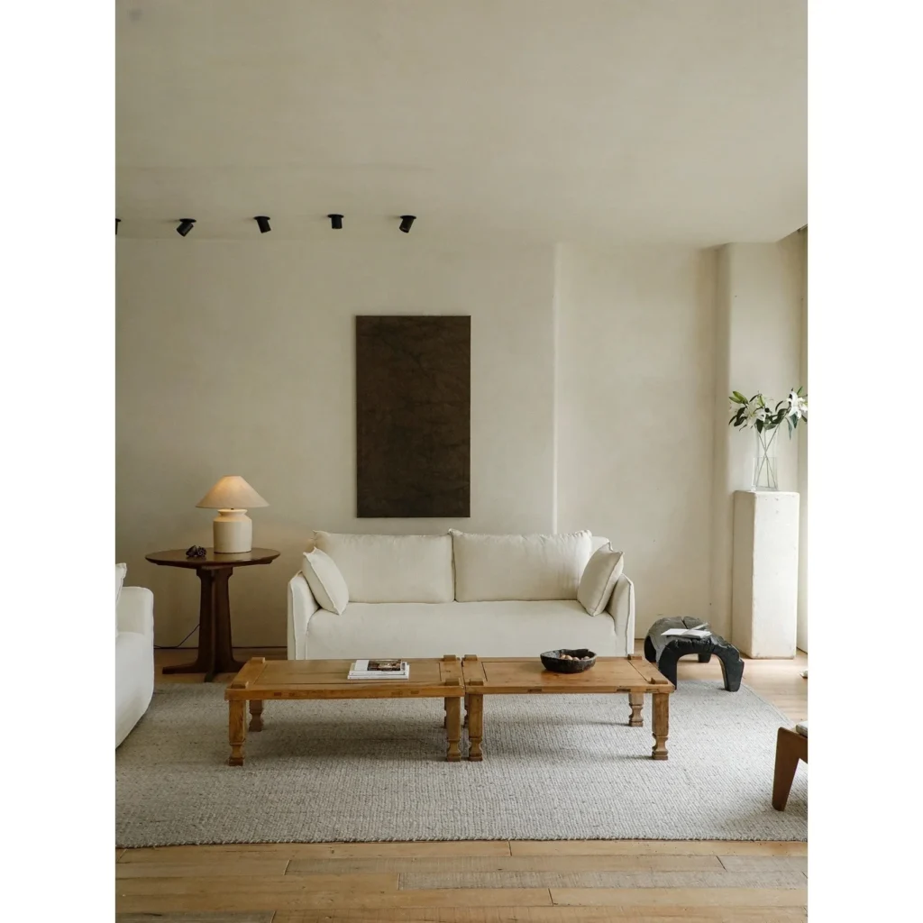 Reclaimed Wood Coffee Table with Cream Linen Sofa in natural oak — in a room setting