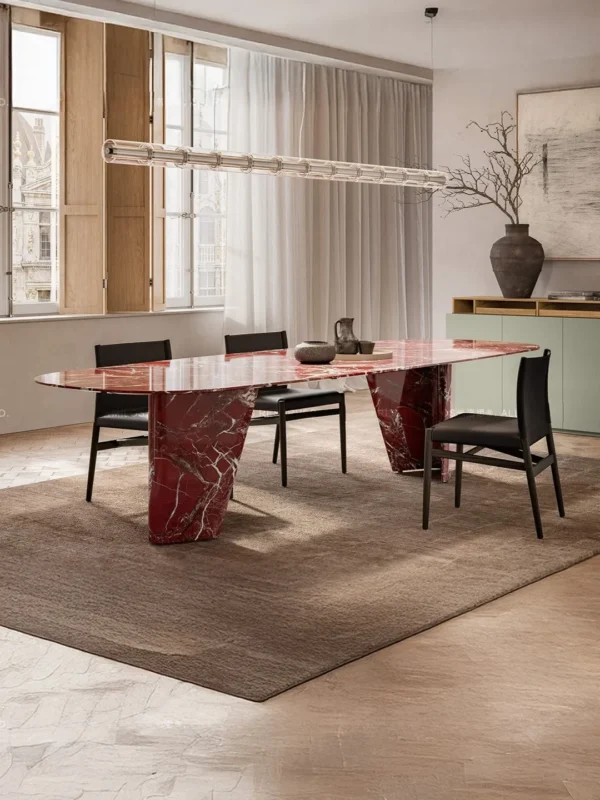 Red Marble Dining Table on Angled Stone Slabs in burgundy — in a room setting
