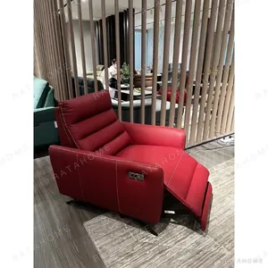 Red Leather Electric Recliner Armchair with German Motor in red — in a room setting