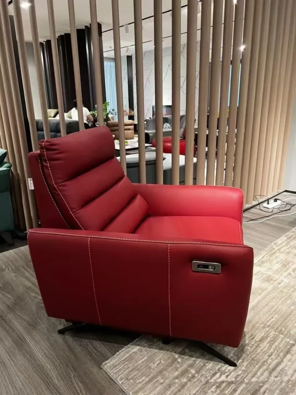 Red Leather Electric Recliner Armchair with German Motor in red — in a room setting