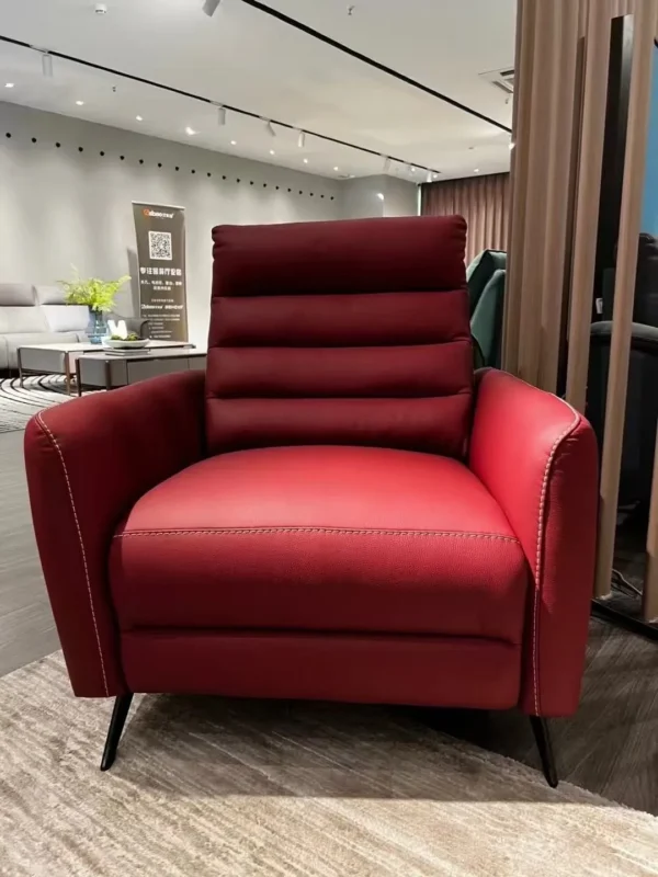 Red Leather Electric Recliner Armchair with German Motor in red — in a room setting