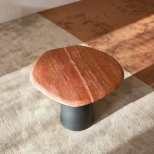 Red Travertine Pebble Side Table on Black Cylinder Base in red — front view