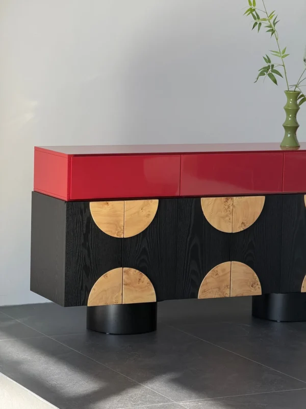 Red and Black Sideboard with Burl Half-Moon Doors in red — in a room setting