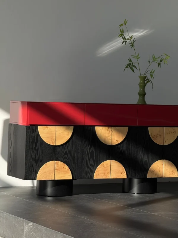 Red and Black Sideboard with Burl Half-Moon Doors in red — in a room setting